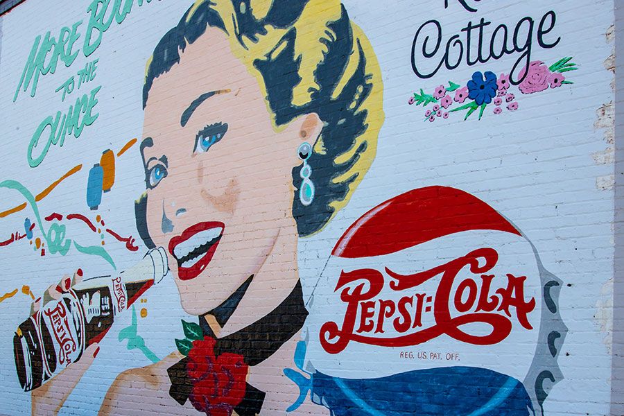 Black Belt mural of Pepsi Girl in Crenshaw